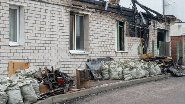 Professional Fire Damage Restoration technician working in Lonsdale, MN